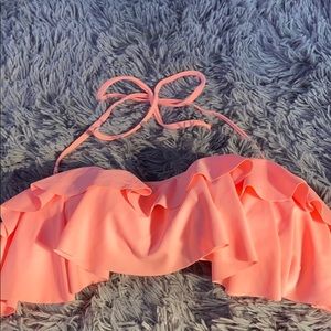 Ruffled pink bathing suit top